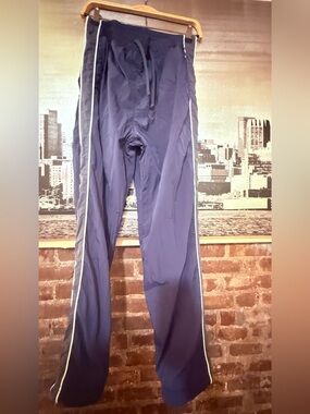 track navy pants front pockets and string waist band side leg detail